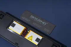Show photo: Detachable back cover with the 8000mAh battery